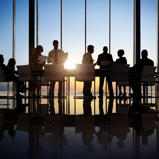 Business people working in a conference room.